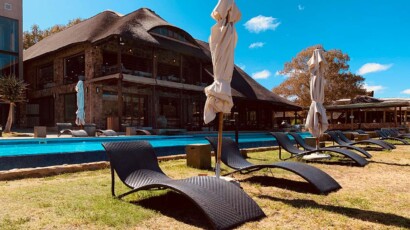 Exclusive guest restaurant and pool. The restaurant has an upstairs viewing where guests can enjoy cocktails. Aquila game reserve main building and swimming pool